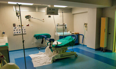 View of an empty hospital bed in the maternity ward at a hospital