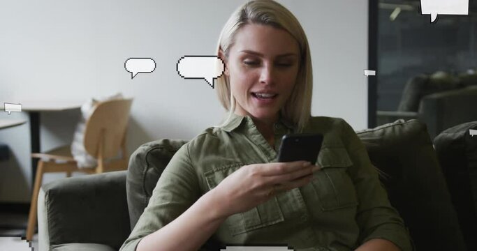 Animation of speech bubbles over caucasian businesswoman using smartphone