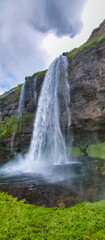 Seljaland Waterfalls, Iceland. Amazing landscape with water and vegetation