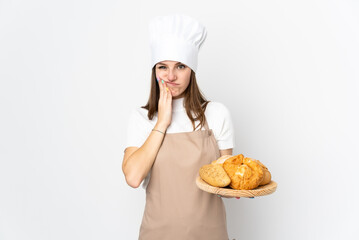 Young woman in chef uniform isolated on white background unhappy and frustrated