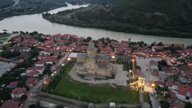 Beautiful view of streets of Mtskheta village in Georgia with Svetitskhoveli Cathedral fortress in the center