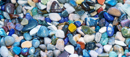 Colourful mineral stones collection in a creek