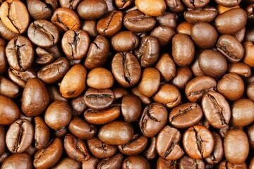 Background of coffee beans. It is popular for making a fragrant invigorating drink.