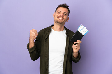 Young caucasian handsome man isolated on white background happy in vacation with passport and plane tickets