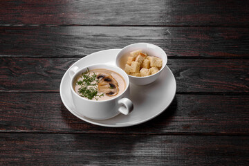 Cream of mushroom soup. Home-made with whole and sliced mushrooms