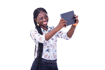 portrait of a beautiful young businesswoman with tablet, smiling.