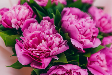 Obraz premium background texture with a bouquet of pink peonies