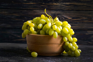 fresh grapes on wooden background