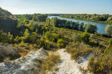 View of the Don River and the floodplain forest from the top of the chalk slope of the right bank in the vicinity of the village of Vyoshenskaya