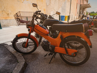 Fototapeta na wymiar moped in the parking lot in the city
