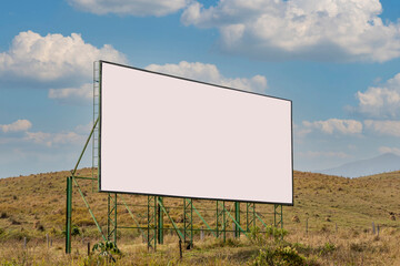 white advertising billboard on the road. outdoor. advertising panel
