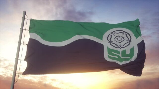 South Yorkshire flag, England, waving in the wind, sky and sun background