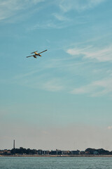 Fototapeta na wymiar fire-fighting aircraft in action at the beach in zadar. High quality photo