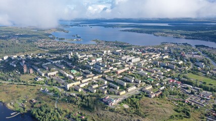 View of the city from above. Houses. Lake.