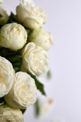 white roses in a vase