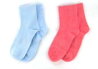 New socks on a white background. Colorful socks with beige label for your design. Isolated object