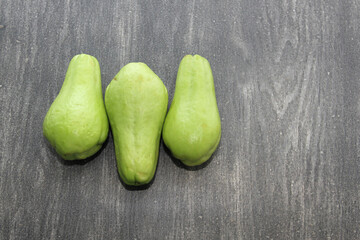 Vegetable chayote green squash fresh, natural raw, ready to cut and cook, very nutritious and dithetical
