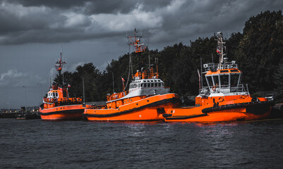 Fototapeta premium Large cargo ships moored in the shipyard canal in Gdańsk