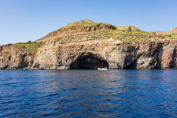 Lipari island (Aeolian archipelago), Messina, Sicily, Italy: view of the seacoast with caves.