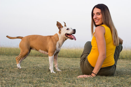 Woman enjoying time with her Dog. Spending time together