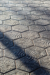 Sidewalk of the Paseo de Gracia, designed by Antonio Gaudi in Barcelona, Catalonia, Spain