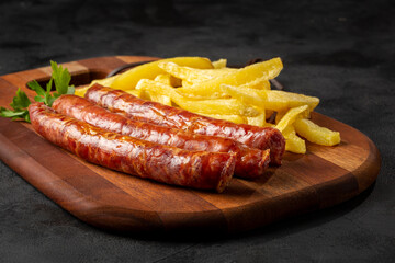 Grilled German sausage with french fries.