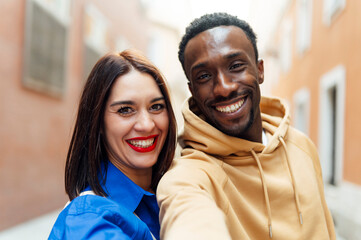 Couple Taking A Selfie On Street