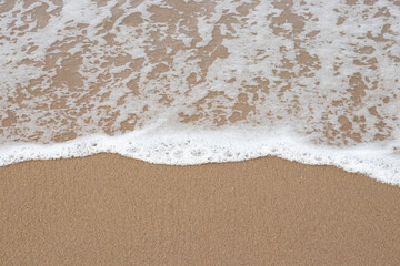 waves on the sand