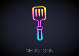 Glowing neon line Barbecue spatula icon isolated on black background. Kitchen spatula icon. BBQ spatula sign. Barbecue and grill tool. Vector