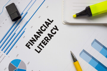 Business concept meaning FINANCIAL LITERACY with sign on the piece of paper.