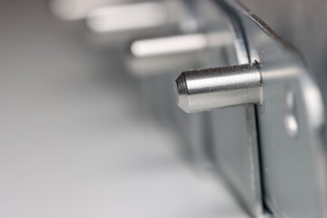 Close up shot of metal brackets with metal studs