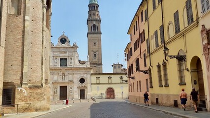 Fototapeta na wymiar Italian street in Parma with the monastery and church of San Giovanni Evangelista 