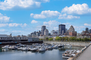 Panoramic view of Montreal modern skyline of downtown financial city center and Old Port of...