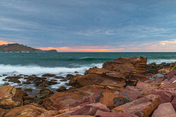 Sunrise seascape with cloud cover