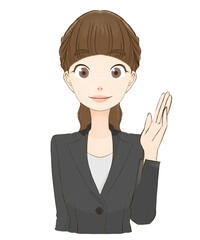 笑顔で案内するスーツを着た女性