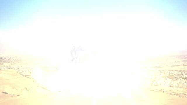 Nuclear Atom Explosion over City in the Desert, aerial view
Drone view over Jericho city Near dead sea and Jerusalem, explosion  with shock wave fire smoke and debris
