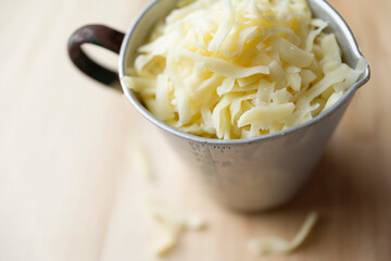 cup of thick cut grated mozzarella