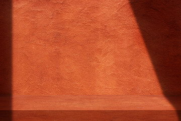 Empty space of Orange clay wall grunge texture background for show product.