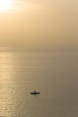 Beautiful misty sunset off the coast of Dakar, Atlantic Ocean