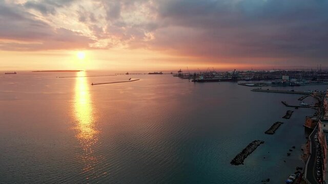 Sea port. Ships and boats at dawn. Sea town. Taranto