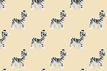 Toys seamless pattern. Plastic zebra toy isolated on beige background.