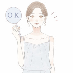 OKサインを出す女性
