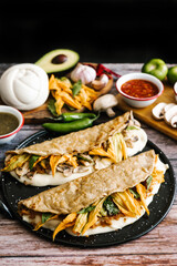 Quesadilla typical mexican dish with various ingredients served for breakfast in Mexico