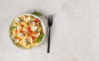 Traditional Italian seafood pasta with clams. Spaghetti alle Vongole.