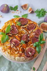 Homemade quiche tart with figs, cream cheese