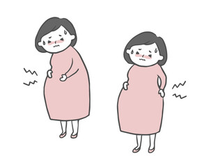 腰痛と腹痛に苦しむ妊婦