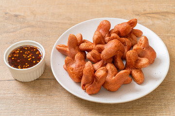 fried sausage with dipping sauce