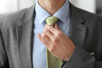 Young man in stylish suit, closeup