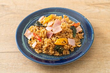 Obraz na płótnie Canvas ham fried rice with herbs and spices
