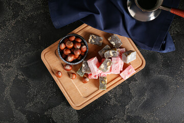 Composition with sweet Turkish delight on black background
